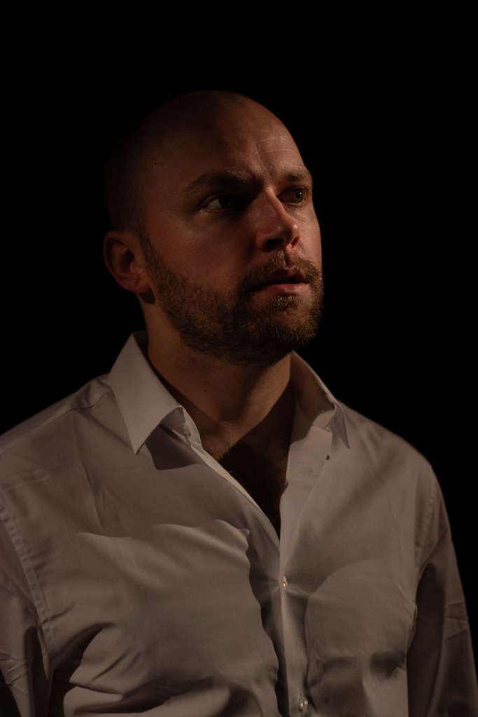 Him (played by Andy Sellers)